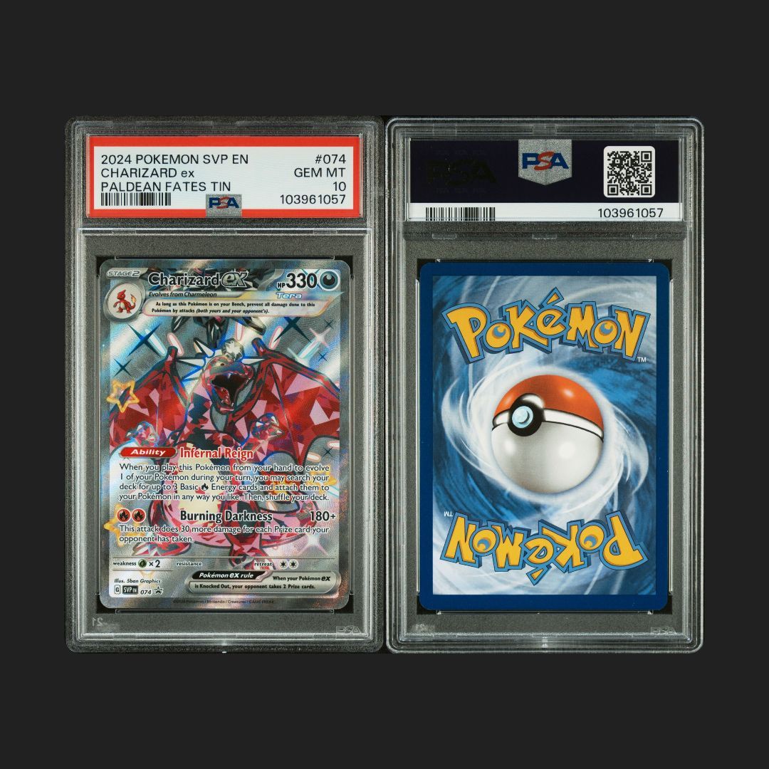 Two Pokémon trading cards in protective cases with visible PSA grading labels.
